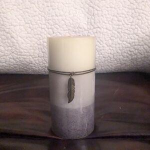 Elegant Cream and Gray Candle with Feather Accent